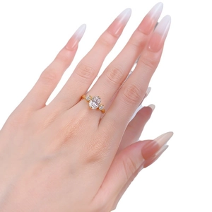 Elegant gold S925 silver ring featuring an oval-cut carbon diamond with side accents