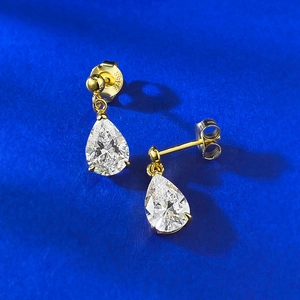 Elegant S925 sterling silver teardrop stud earrings with pear-cut clear gemstones