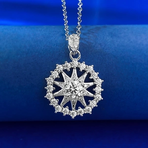 Macro shot of S925 silver snowflake necklace pendant with sparkling white stones