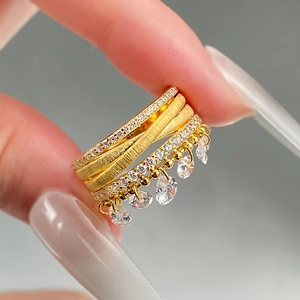 S925 gold-plated stacked ring with brushed metal layers and five teardrop crystal charms