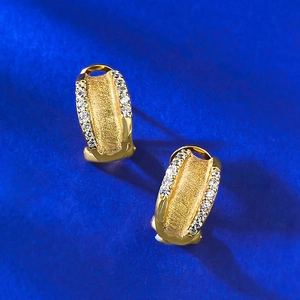 Brushed gold huggie earrings with double-row micro-pave cubic zirconia crystals