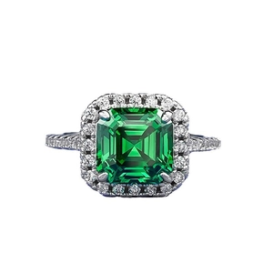 S925 sterling silver ring with emerald-cut green stone and twisted cable band detail