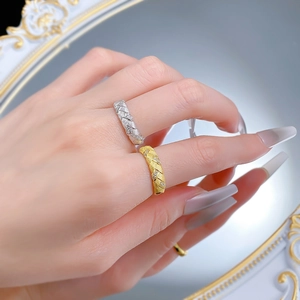 Detail of woven texture S925 silver rings with diamond inlay and brushed finish