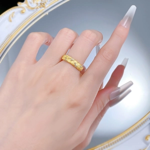 Detailed view of woven brushed S925 silver ring with small zircons on a hand