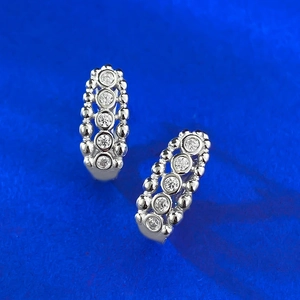 S925 sterling silver hoop earrings featuring five cubic zirconia and beaded textures