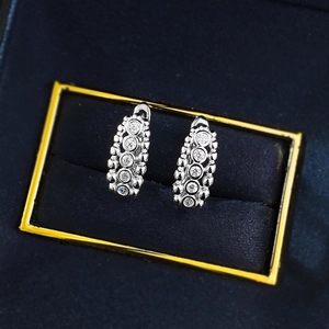S925 sterling silver hoop earrings featuring five sparkling round cubic zirconia stones