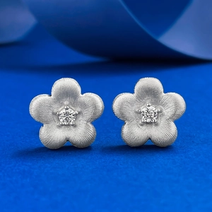 S925 silver gold-plated flower stud earrings with brushed texture and zircon center