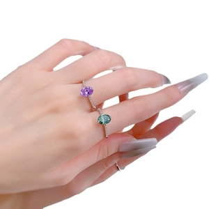 925 silver ring with 6x8mm oval green tourmaline and purple stones on model hand