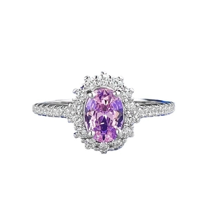 Elegant S925 silver halo ring featuring an oval pink sapphire and pave-set cubic zirconia