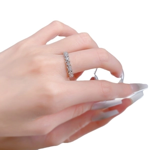 Elegant S925 sterling silver hollow lace ring with sparkling crystals on female hand