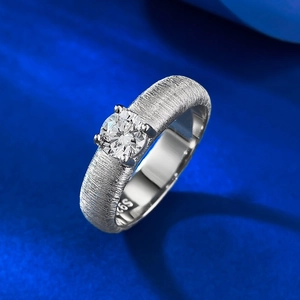 S925 sterling silver ribbon ring with brushed texture and four-prong solitaire diamond