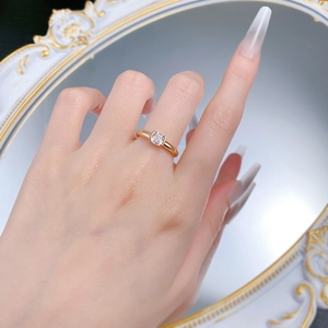 Elegant gold S925 silver ring with 5x5mm Asscher cut clear stone on a model's finger