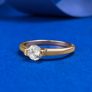 Classic S925 silver gold plated ring featuring a 5.0mm round cut white cubic zirconia solitaire