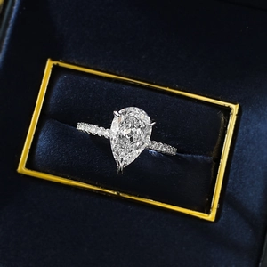 Elegant S925 silver pear cut white zircon ring with half eternity pavé band in a box