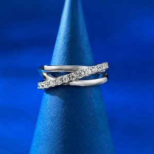 Macro detail of S925 sterling silver triple-band ring with pavé set zircon stones