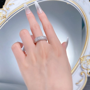 Close-up of S925 sterling silver ring with triple rows of pavé set zircon stones