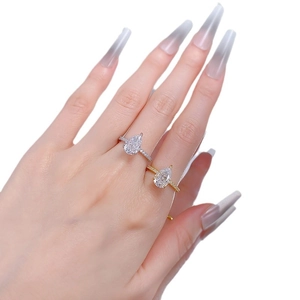 Elegant pear cut cubic zirconia teardrop rings in silver and gold finishes for women