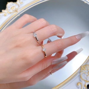 On-hand display of S925 silver and gold-plated rings with 5mm round cubic zirconia