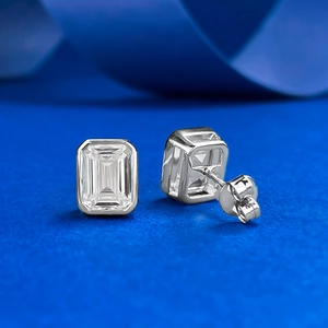 Macro detail of emerald cut rectangular clear crystal earrings with S925 silver studs