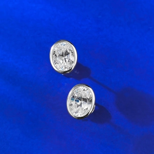 Classic 925 sterling silver stud earrings with 6x8mm oval cut clear cubic zirconia stones