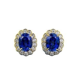 Elegant S925 silver stud earrings featuring oval royal blue gemstones and halo diamonds
