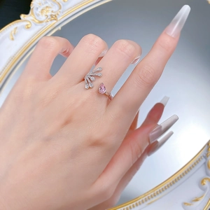Detailed shot of a 925 silver pear-shaped pink gemstone ring with delicate zircons