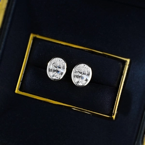 S925 silver 6x8mm oval cut stud earrings in blue velvet jewelry box display