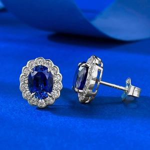S925 Sterling Silver Royal Blue Oval Halo Stud Earrings with shimmering crystal accents