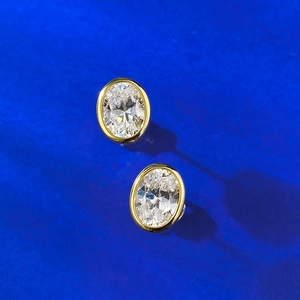 Classic S925 silver 6x8mm oval cut stud earrings with gold plating and clear stones