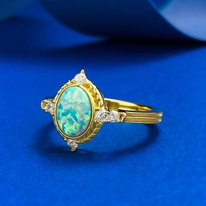 Vintage S925 gold-plated ring with oval opal stone and sparkling zircon accents