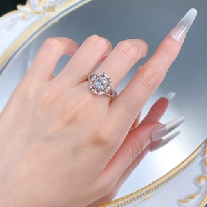 Macro view of S925 silver oval-shaped floral ring with sparkling zircon halo stones