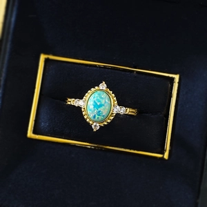 Luxurious S925 silver gold-plated ring with oval opal stone in a velvet display box