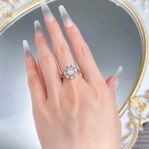 Detailed close-up of S925 silver oval halo ring with sparkling marquise side stones
