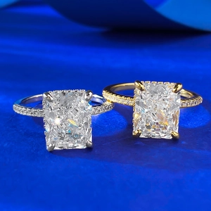 Macro view of radiant cut ring with micro-pave setting in silver and gold finish