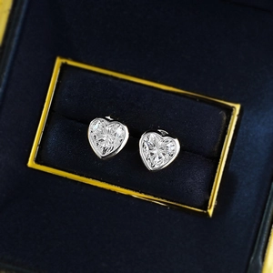 Classic S925 sterling silver heart stud earrings with clear gemstone in a velvet box