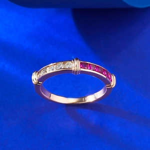 Detail of S925 silver ring with 14K rose gold finish and bicolor gemstone pavé