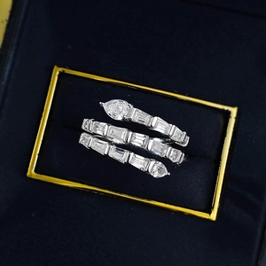 Macro shot of S925 silver snake-style triple wrap ring with stones in a velvet box