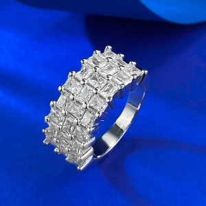Macro detail of luxury S925 silver ring featuring three rows of square-cut zircon stones
