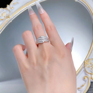 Close-up of S925 sterling silver triple-layer baguette zircon ring worn by a model