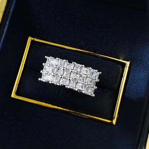 Luxurious S925 silver ring featuring rectangular zircon stones in a velvet box