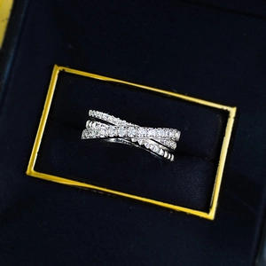 Luxurious S925 silver criss-cross ring with sparkling pavé zircons on black velvet box