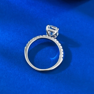 Elegant S925 silver ring with rectangular radiant cut cubic zirconia on blue background