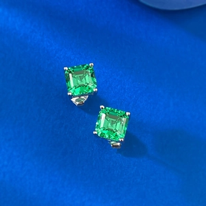 Classic 7x7mm emerald cut green gemstone stud earrings in a four-claw silver setting