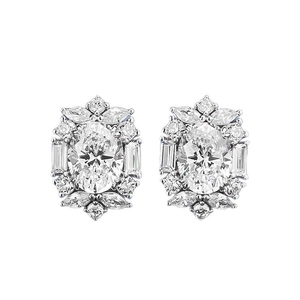 Elegant 7x9mm oval faux diamond stud earrings with silver-tone cluster floral design
