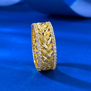 Golden S925 silver wheat ear ring with micro-set zircons on a vibrant blue background