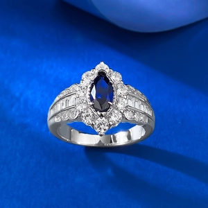 S925 silver ring featuring marquise-cut royal blue gemstone with diamond halo and side accents