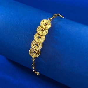 Golden five-coin bracelet with textured ripple finish and high-shine link chain