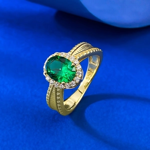 Elegant S925 silver ring with large oval emerald green stone and white zircon halo