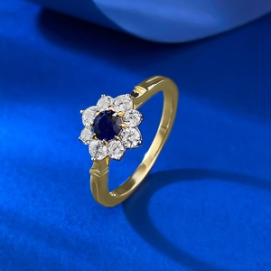 Blue sunflower S925 silver ring with sapphire blue stone and golden band finish