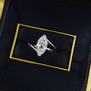 Elegant S925 silver ring featuring a marquise-cut stone on a blue velvet box